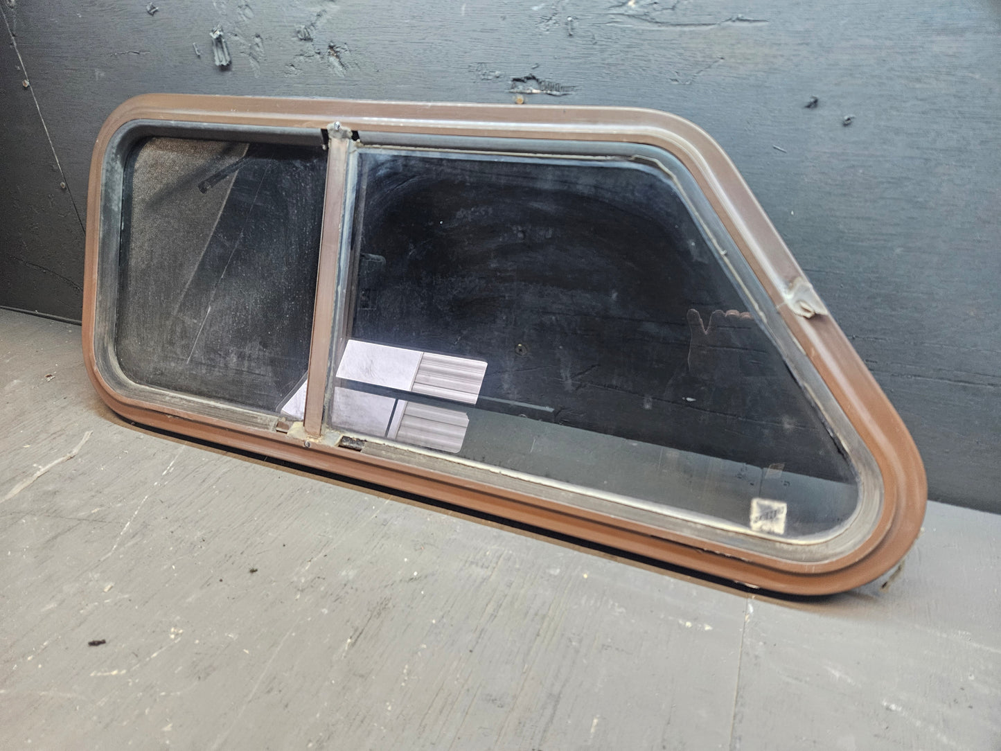 Poor condition angle sliding window brown