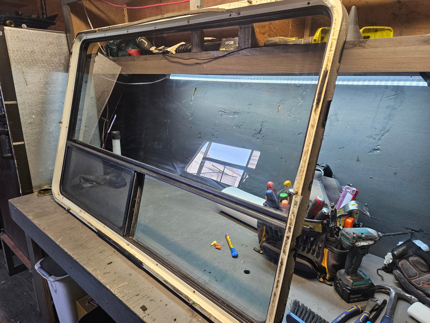 Large picture window with inside storm window black