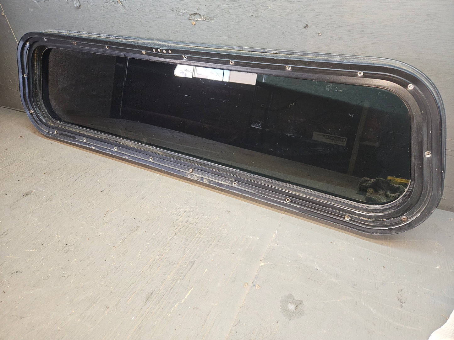Poor condition non opening black window
