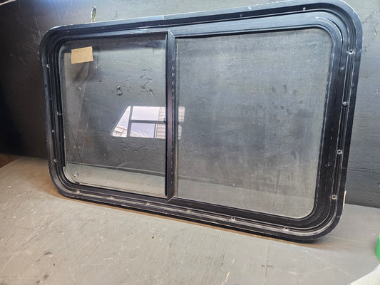 Poor condition slid window black