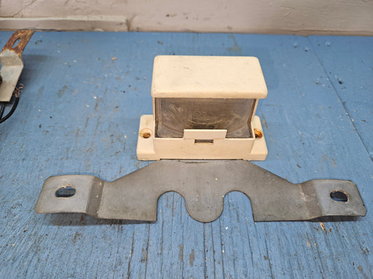 License plate light and holder