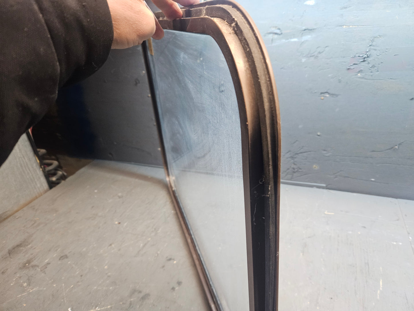 Poor condition window brown.