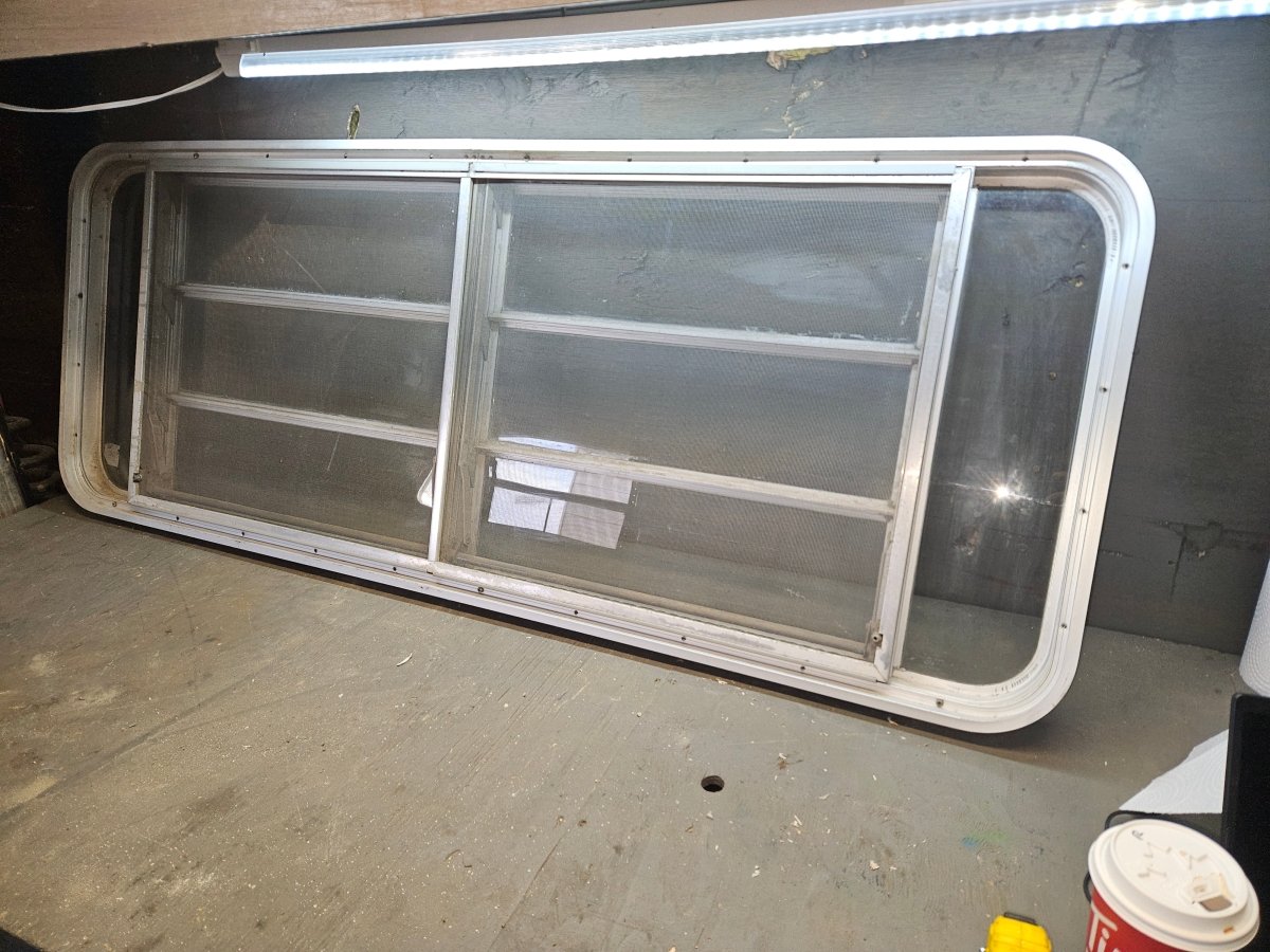 Poor condition silver crank out window