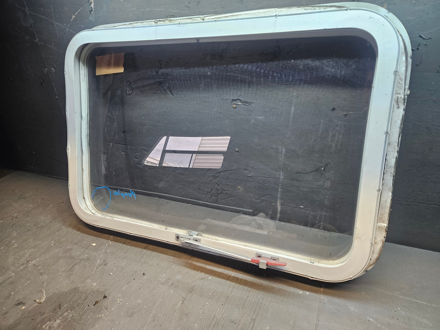 Poor condition escape window white
