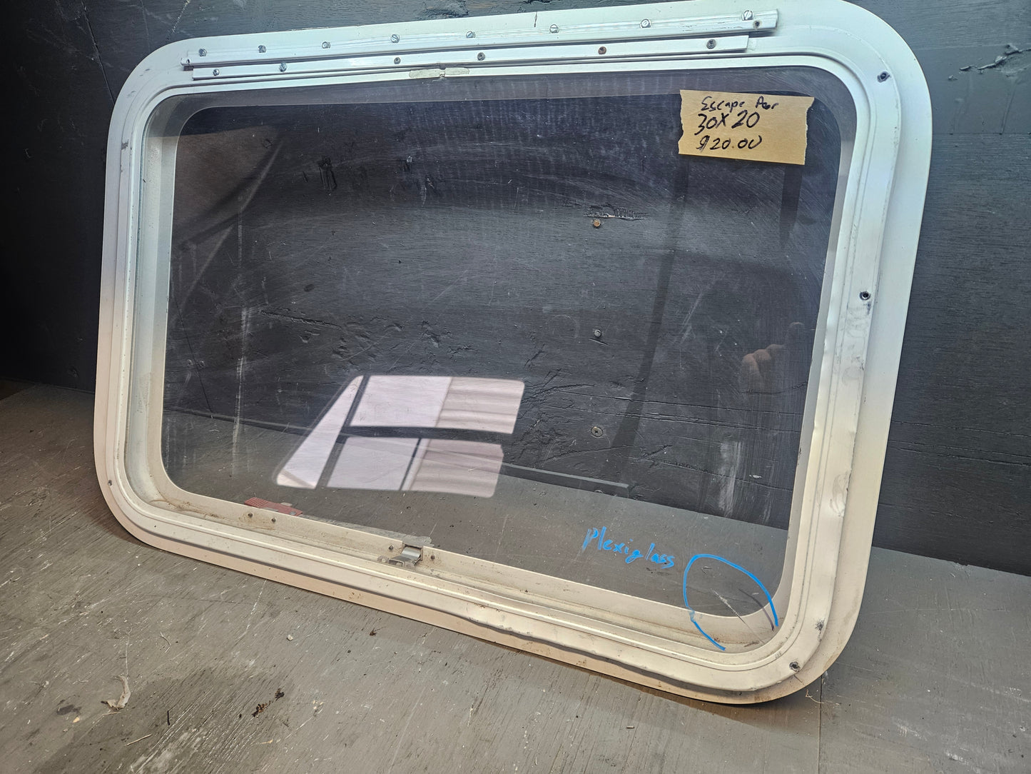 Poor condition escape window white