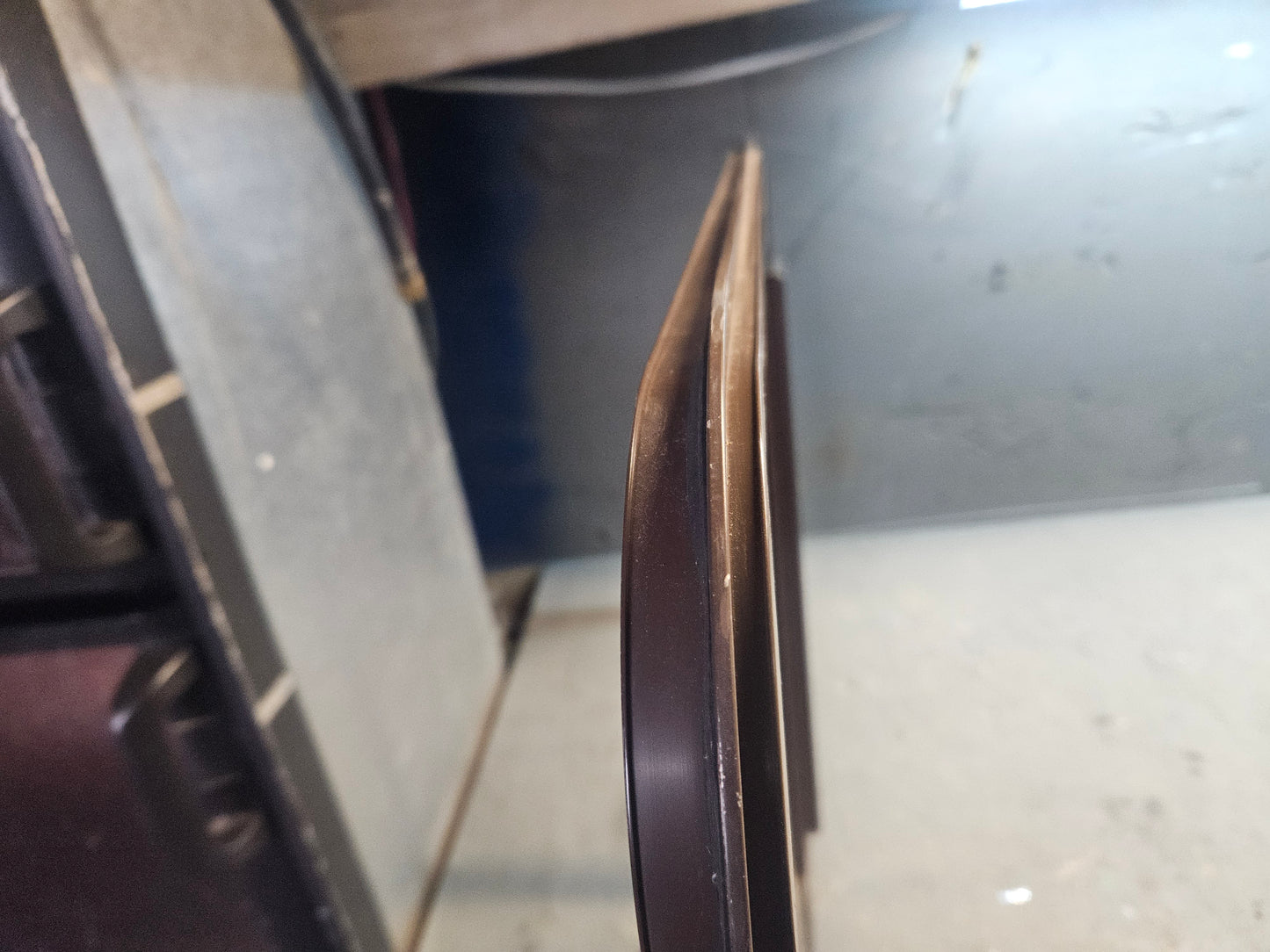Poor condition brown sliding window