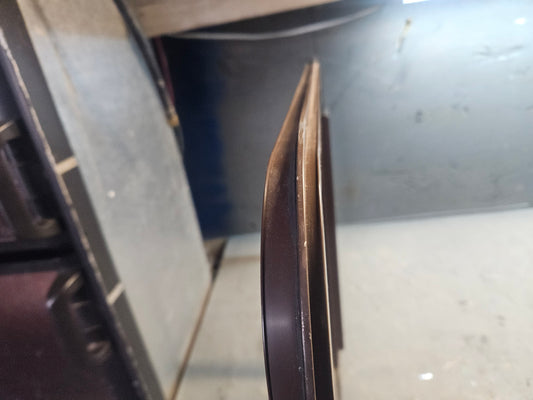 Poor condition brown sliding window