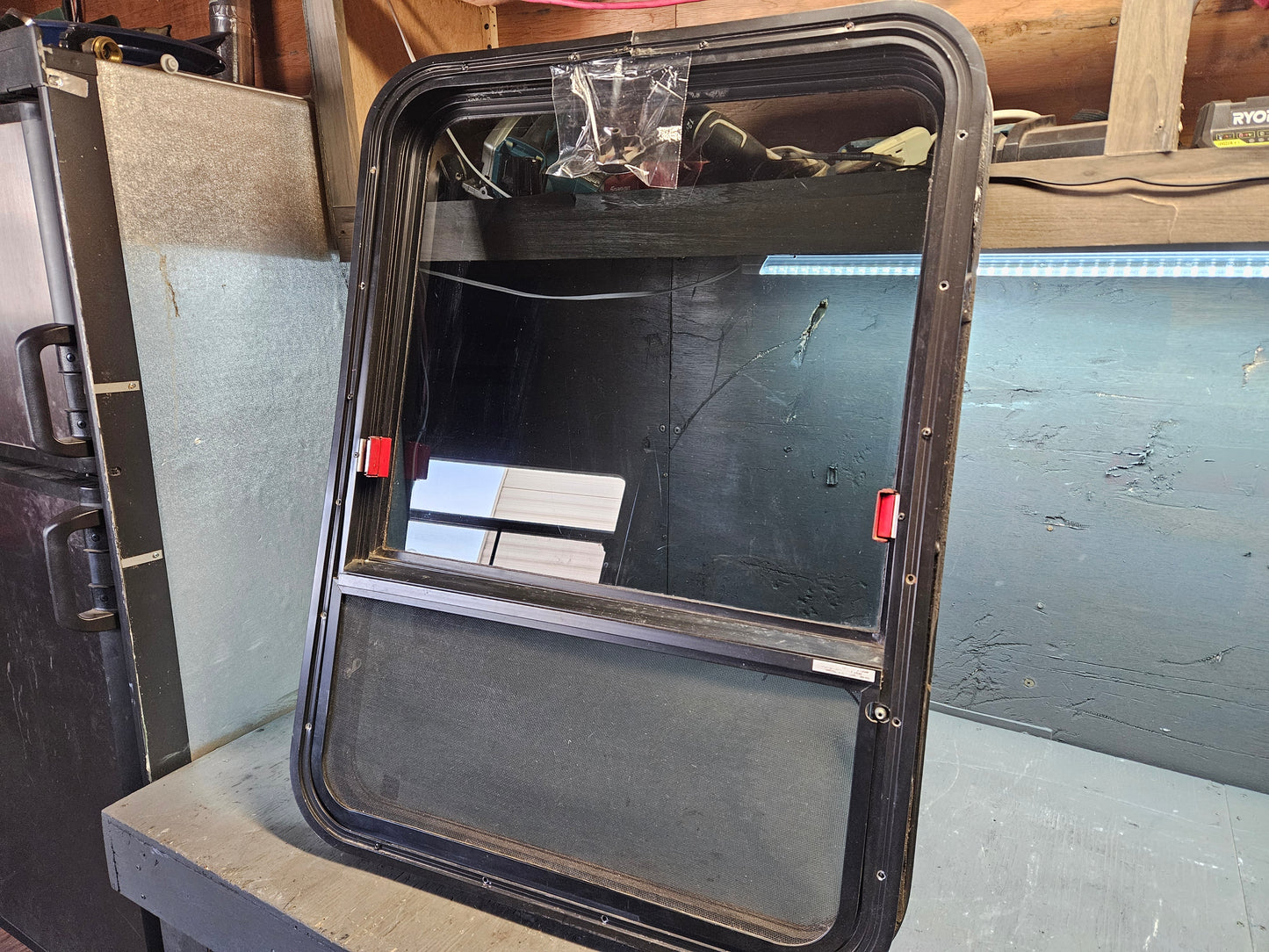 Vertical escape crank combination window black