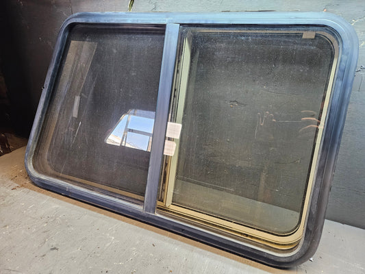 Angle sliding window with storm window black
