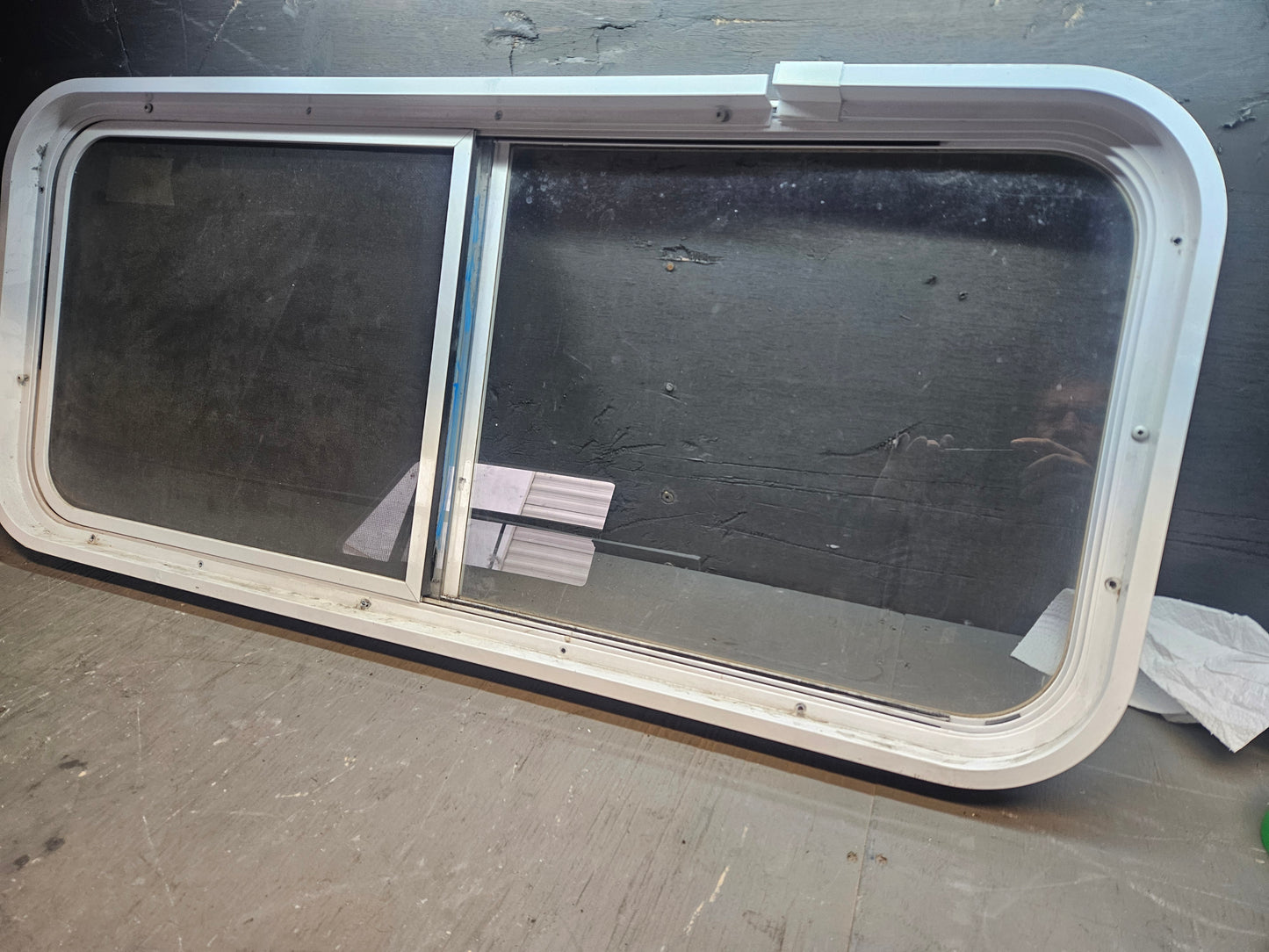 Poor condition sliding window white
