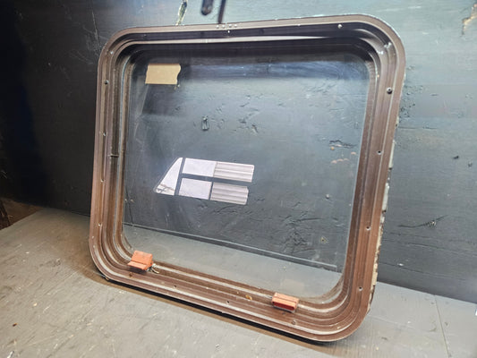 Poor condition escape window brown