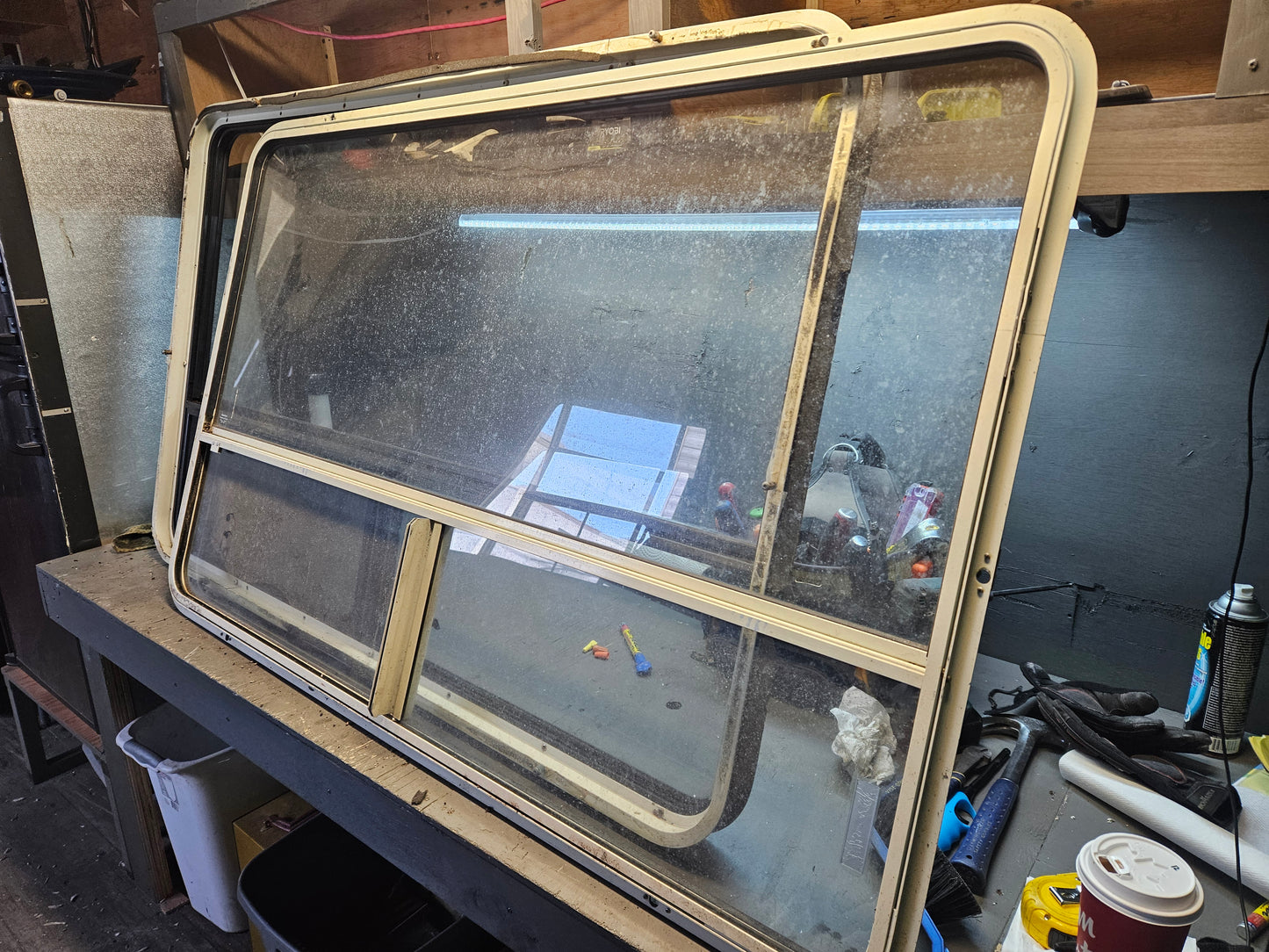 Large picture window with inside storm window black