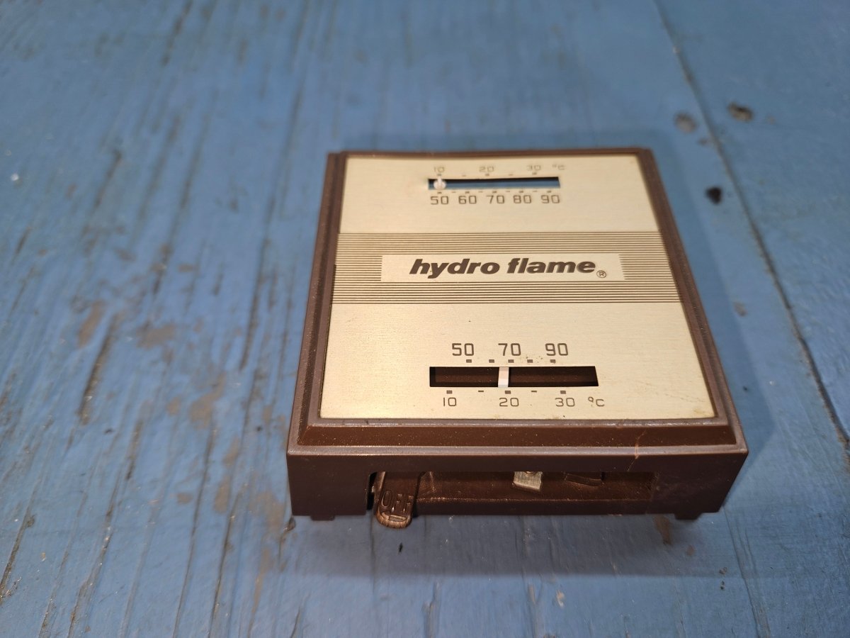 Hydro flame thermostat